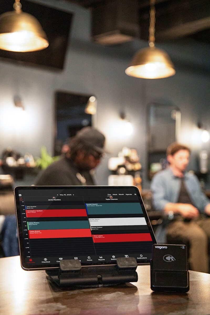 Tablet displays a barber shop's appointment schedule
